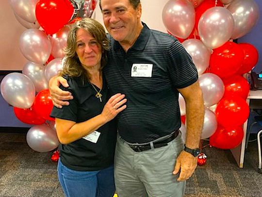 Photo submitted _ The football facility at Lake Mary High School’s Don T. Reynolds has been renovated and the playing surface will be named in honor of longtime coach and Athletic Director Doug Peters (on right, above, right).