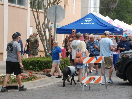Crowd Gathers at Pints and Paws Event in Sanford