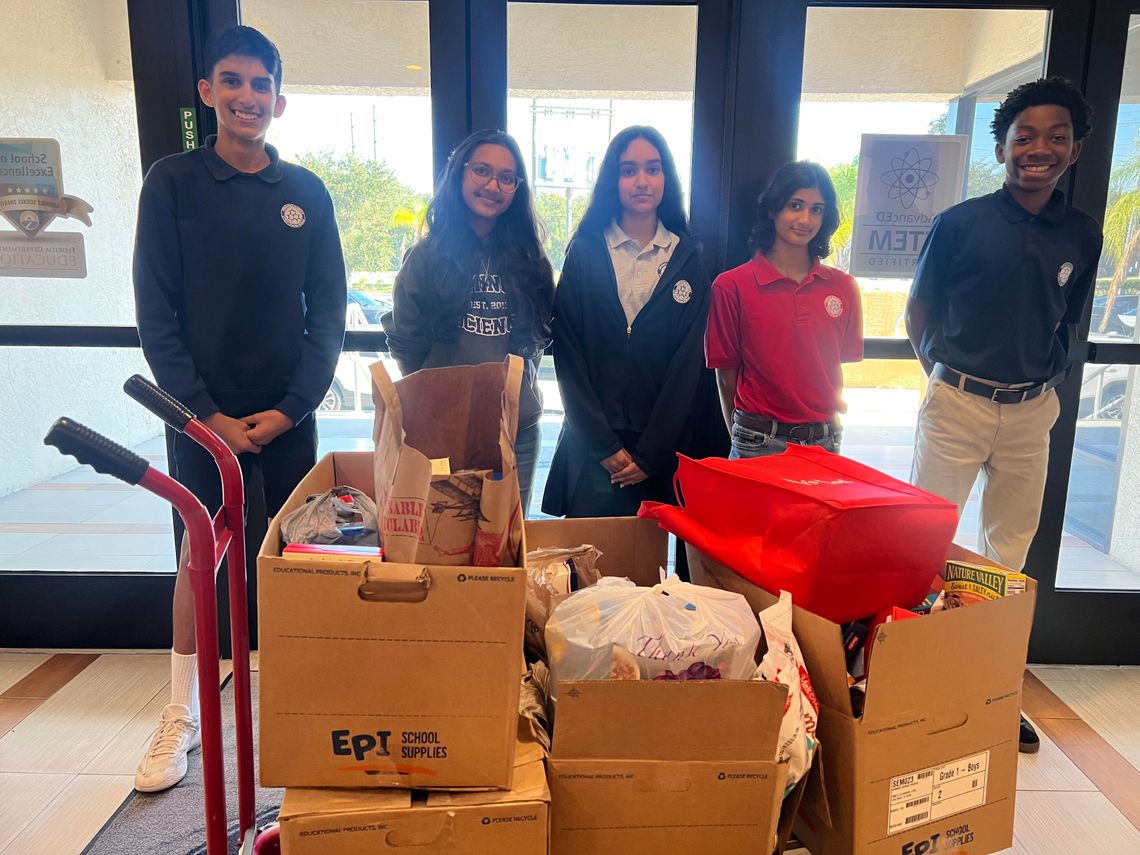 Seminole Science Donates More Than 600 Food Items to The Sharing Center
